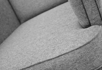 Fotel uszak skandynawski do salonu z podnóżkiem Denver siedzisko materiał - internetowy sklep meblowy Bird Meble