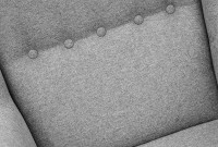 Fotel uszak skandynawski do salonu z podnóżkiem Denver oparcie pikowane guziki - internetowy sklep meblowy Bird Meble